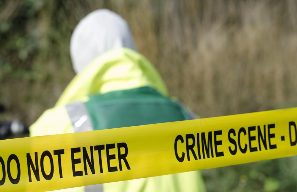 Law enforcement officers set up a crime scene upon arrival to ensure forensic evidence is left intact.
