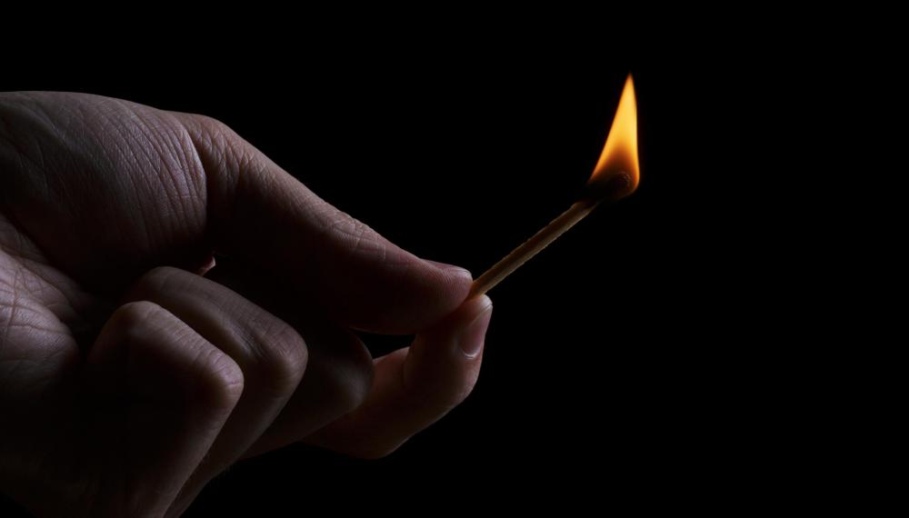 A property owner might set a fire in the hopes of collecting insurance money.