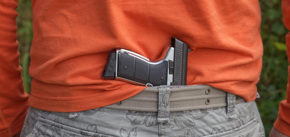 Weapons cannot be visible in most public places.