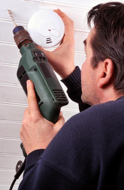 Installing smoke detectors might be part of a city's fire ordinances.