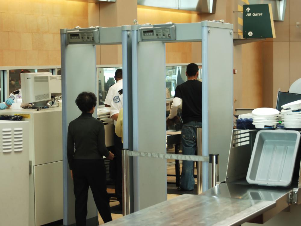 Someone held at airport security without evidence of terrorism activity might be a type of unlawful detainment.