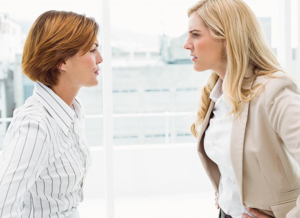 Harassment from coworkers can be disciplined in a number of ways, including reassignment to different departments.