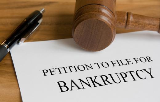 Upon filing a petition for bankruptcy, a debtor's assets are placed in an estate to be reviewed by a trustee.